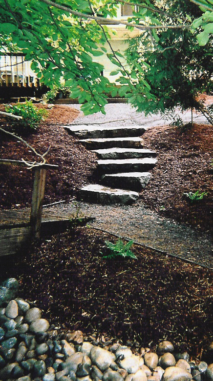 Our 3 to 8 inch cobble used in dry creek bed as seen in bottom of picture.