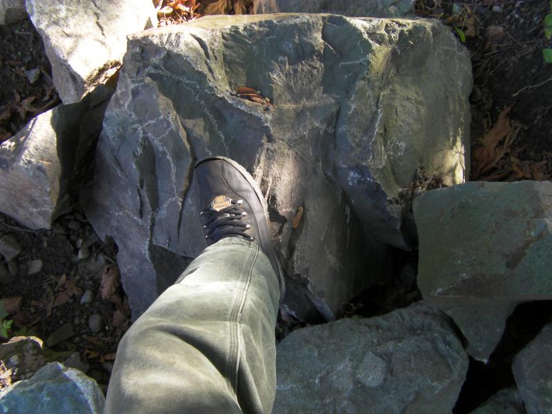 Approx 2 man basalt boulder rock.  Some would call this large one man.