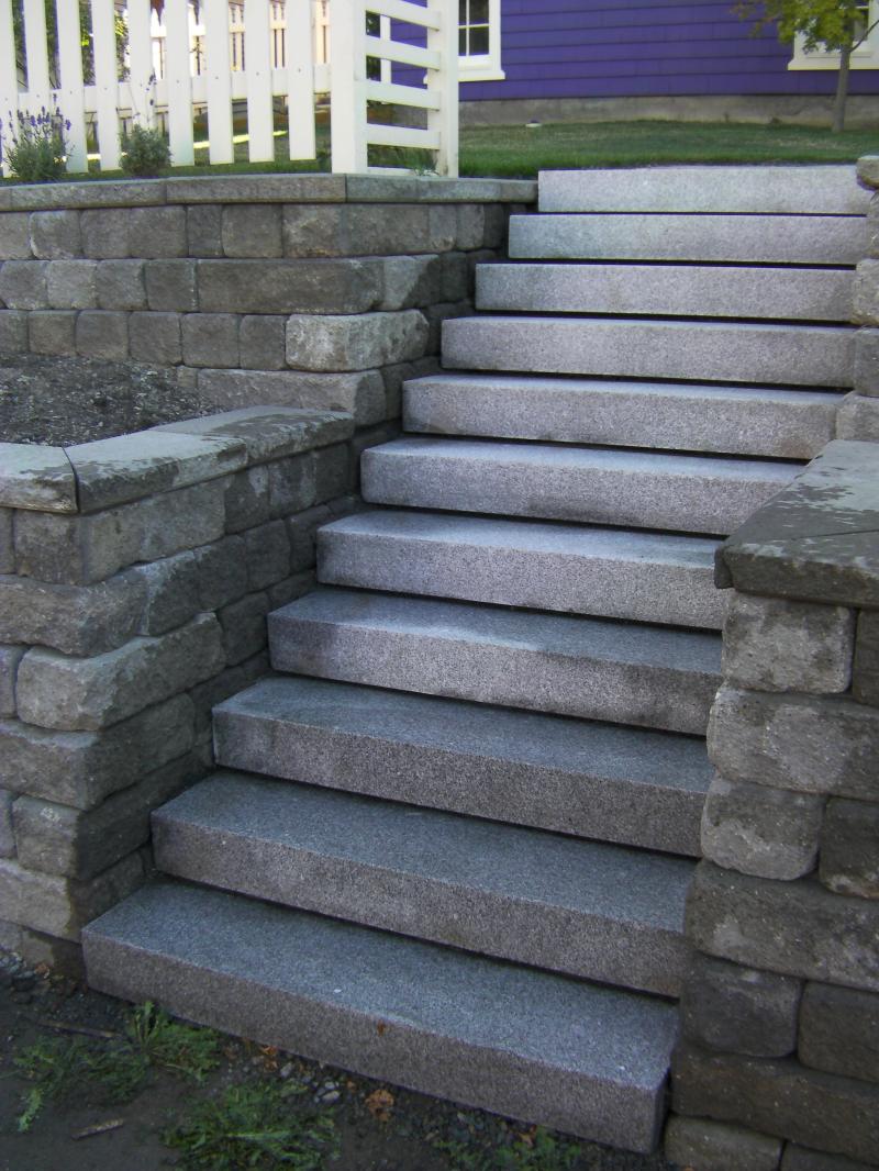 wall block wall with cut granite steps