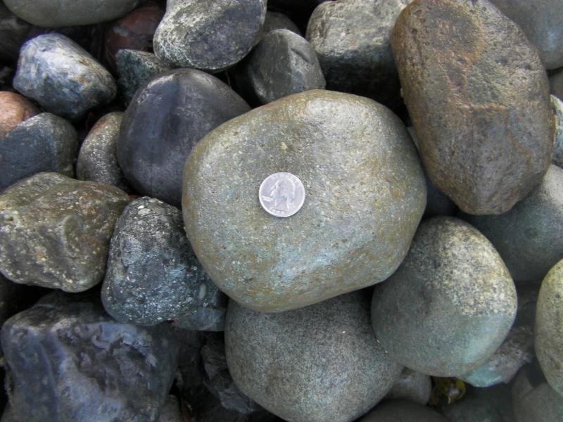 2 to 4 inch cobble.  The product delivered is not washed as shown in picture.